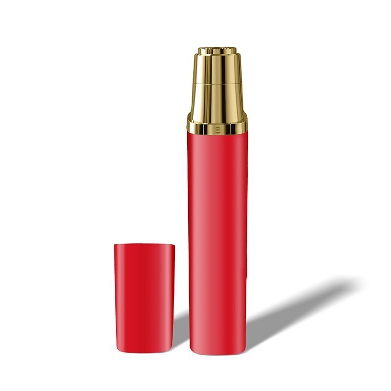 Carmine red portable face hair trimmer with gold accents, cap removed for easy use.